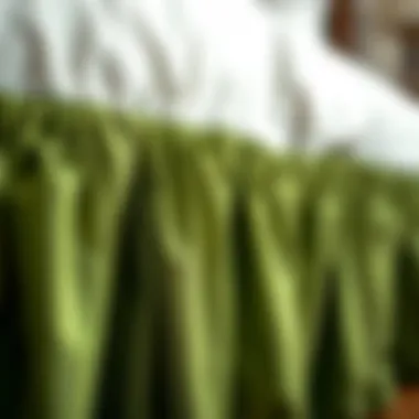 Luxurious Fabric Texture of Green Bedskirt Close-up view of luxurious fabric texture used in green bedskirt