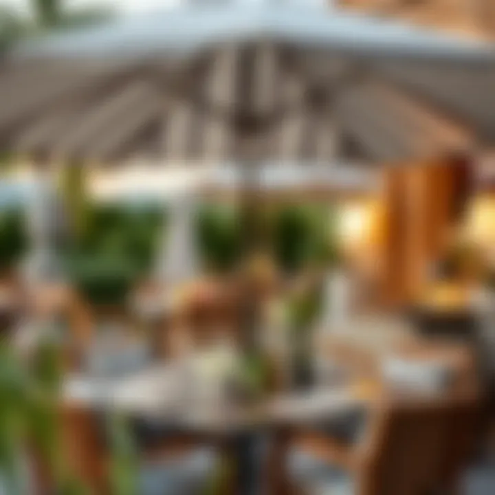 Chic Outdoor Dining Under a Striped Umbrella A beautifully set outdoor dining area with a grey and white striped umbrella