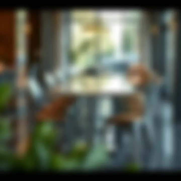 Sleek Metal Chairs Complementing Polished Table Sleek metal dining chairs surrounding a polished table