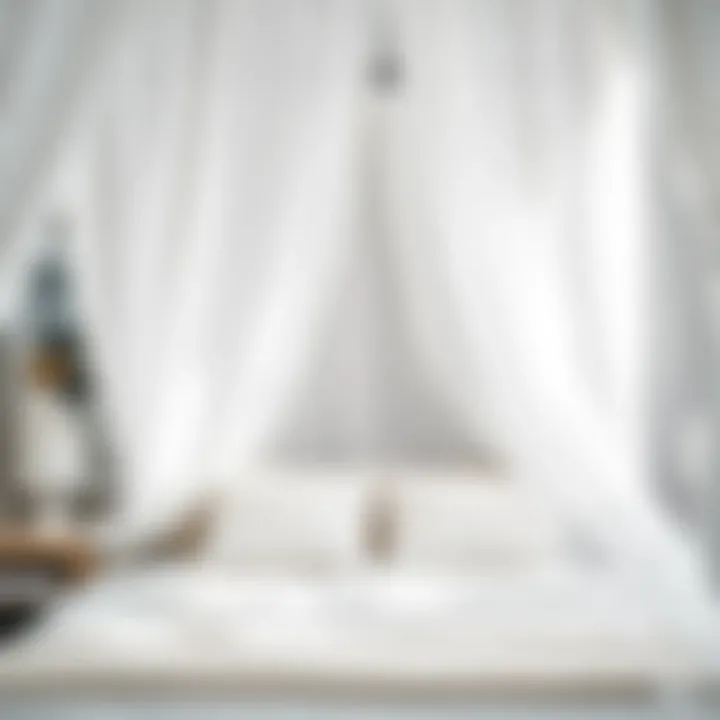 Close-up of white sheer fabric on a canopy bed, highlighting texture and draping