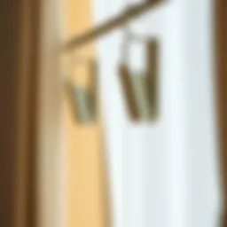 Adhesive hooks displayed on a wall with curtains