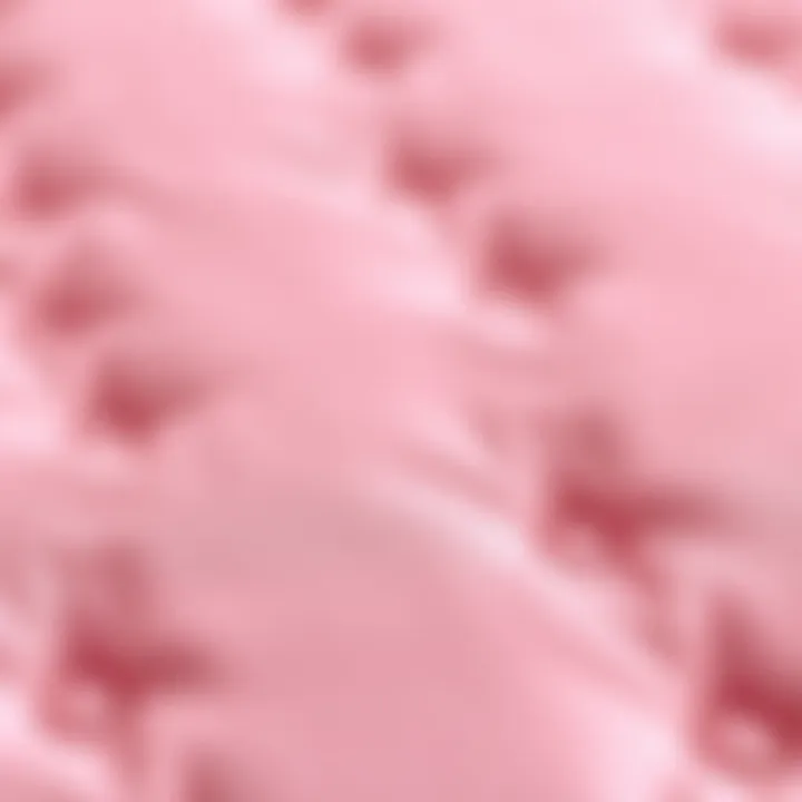 Close-up of pink futon mattress fabric texture